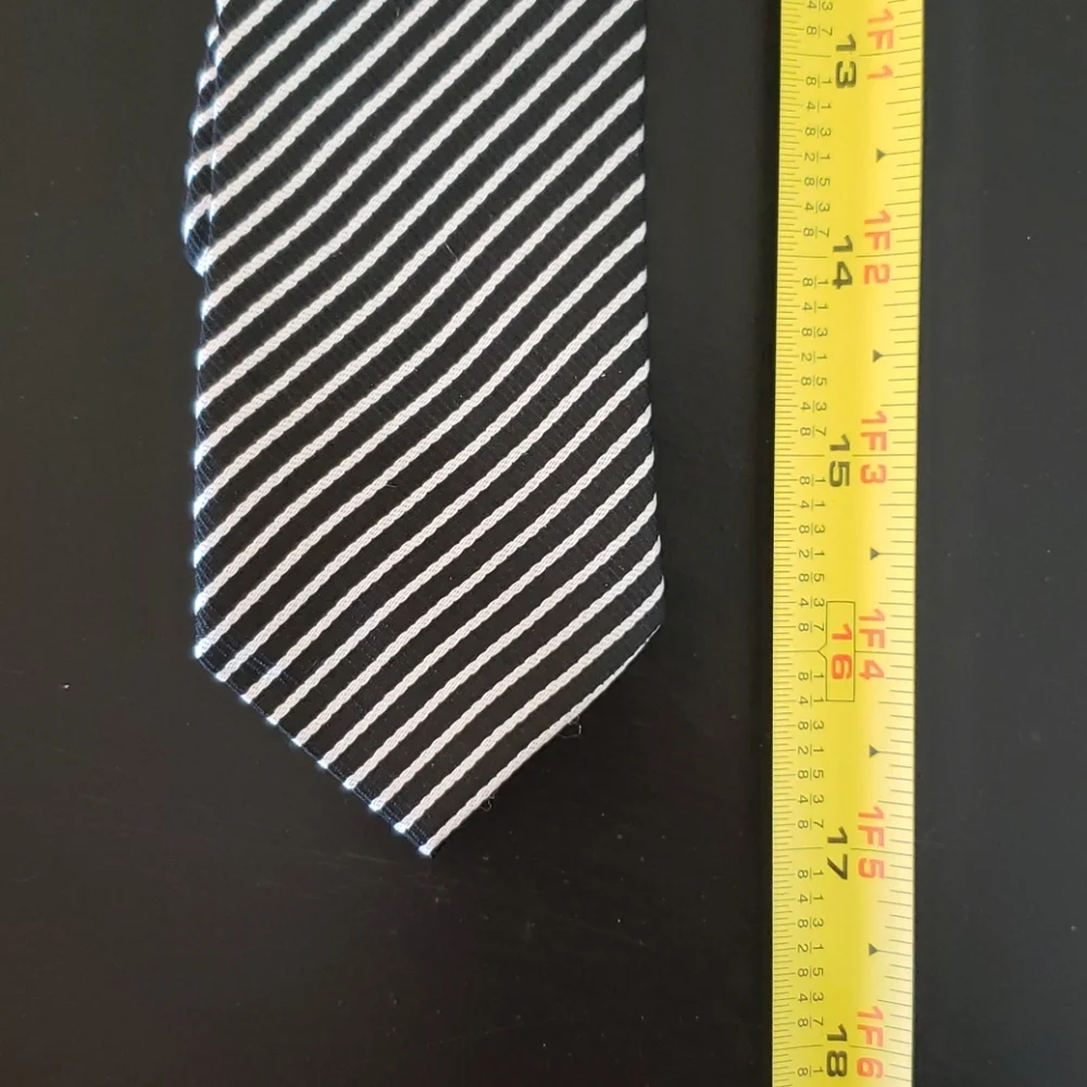Boys black and white striped Polyeste clip on tie.